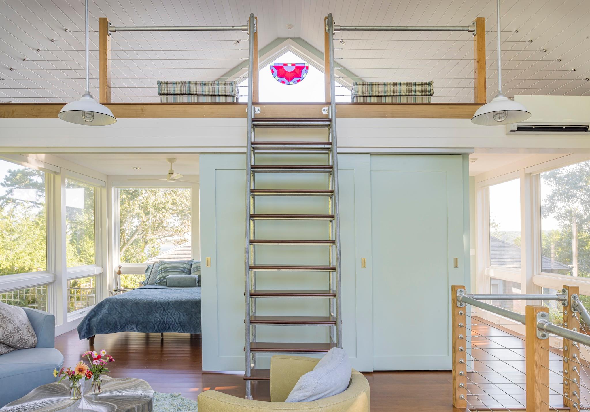 Ladder leading to a sleeping loft in a guest home constructed on Lake Tashmoo
